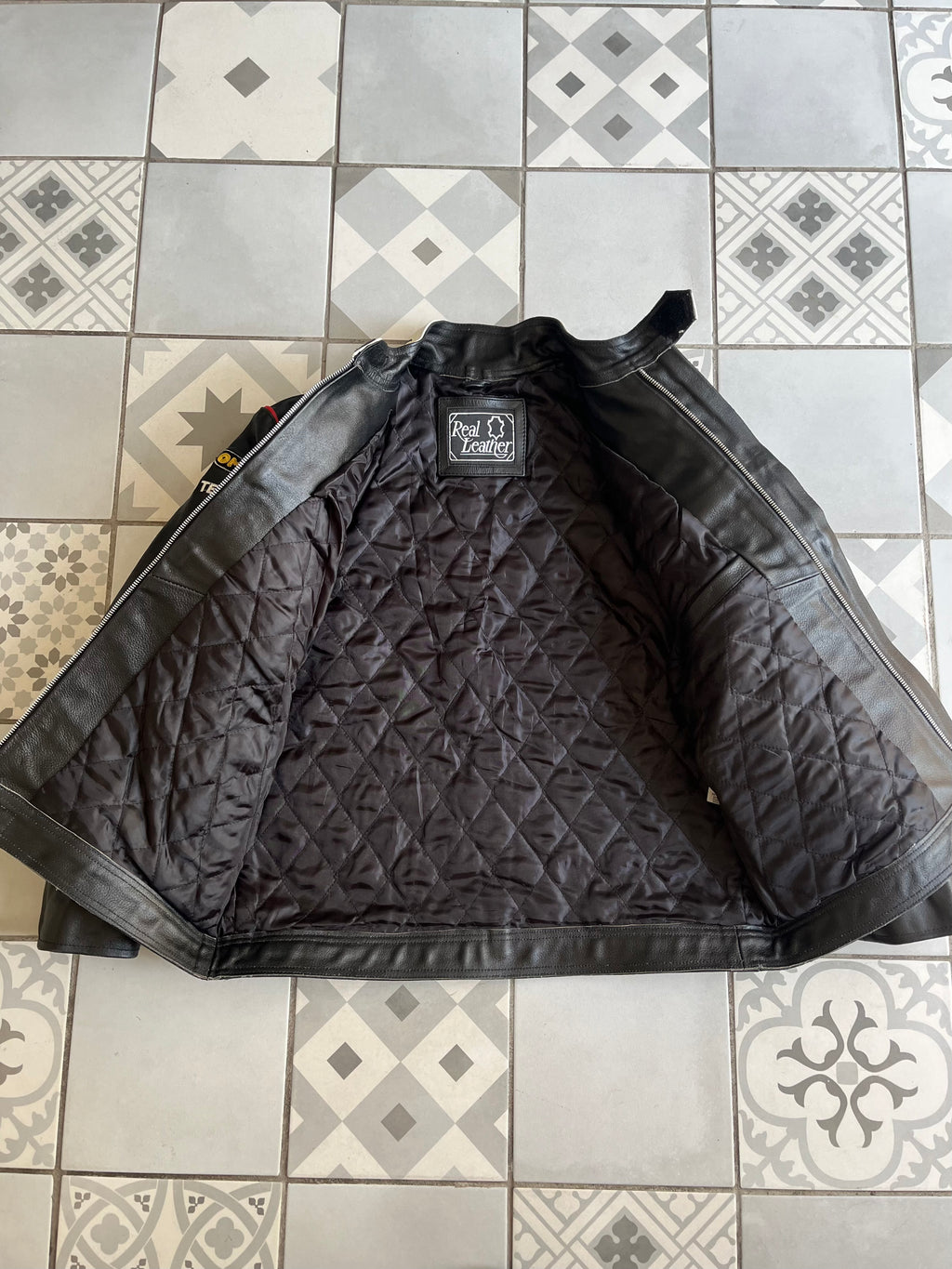 Col montant à pression et finitions métalliques veste Jaguar